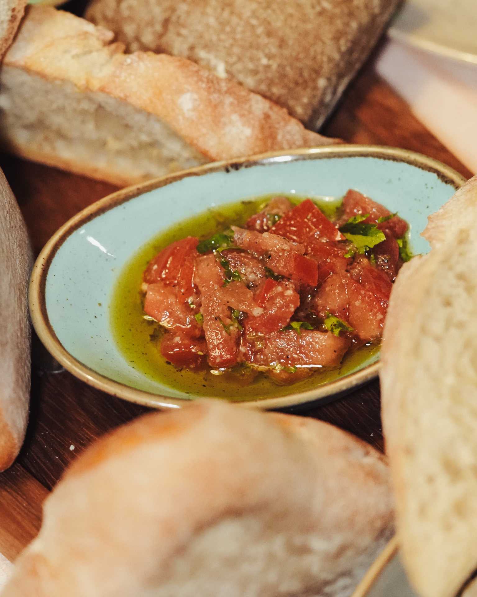 Fresh tomato bruschetta with olive oil and herbs
