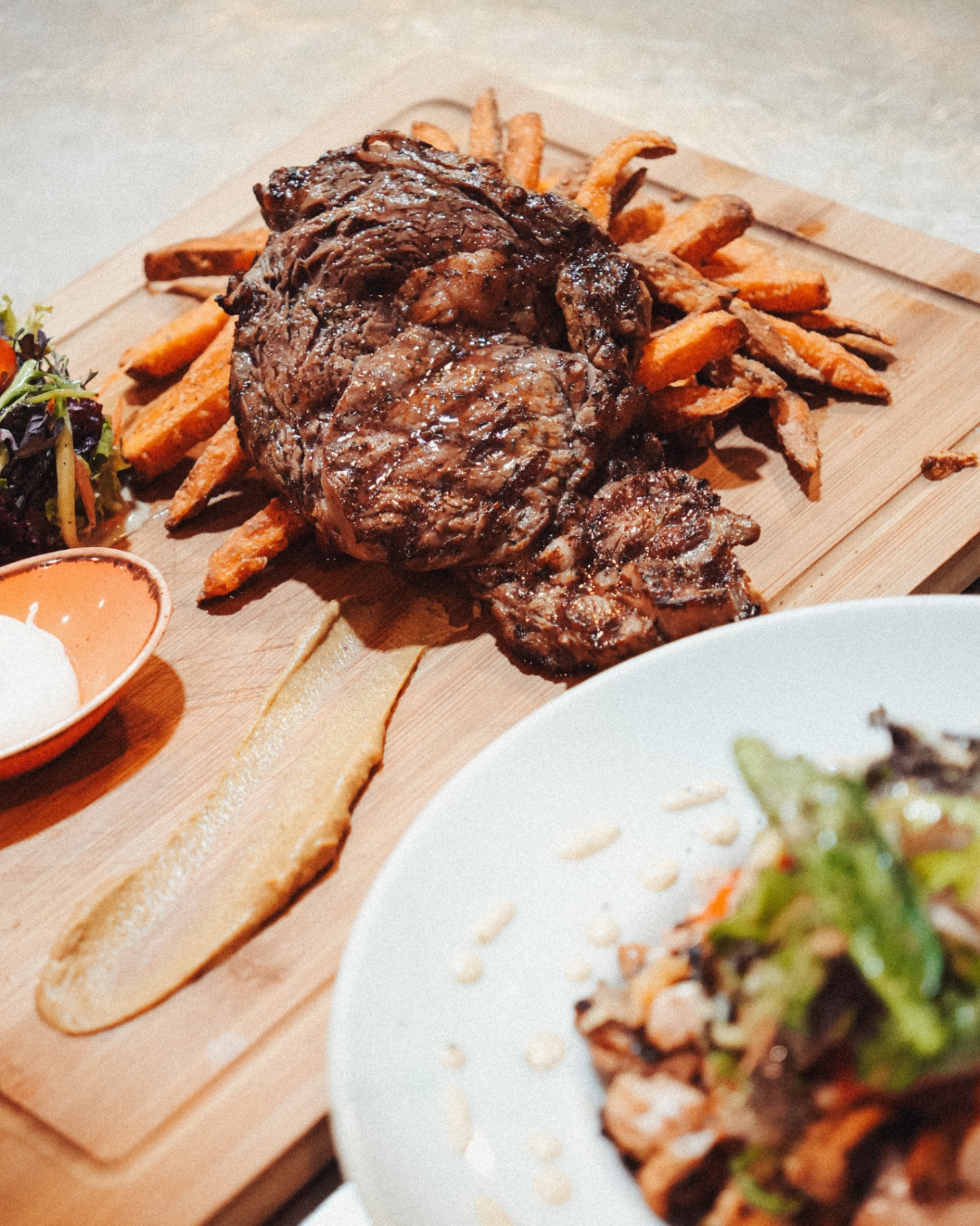 Grilled steak board with sweet potato fries