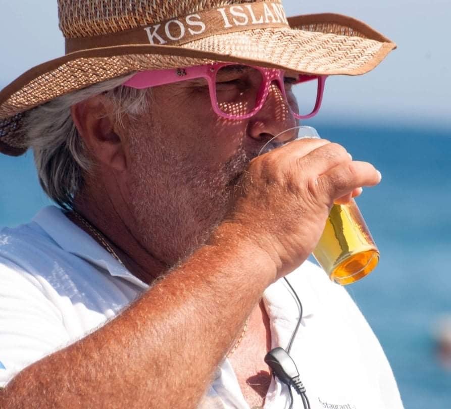 Guest enjoying a cold beer at the beach